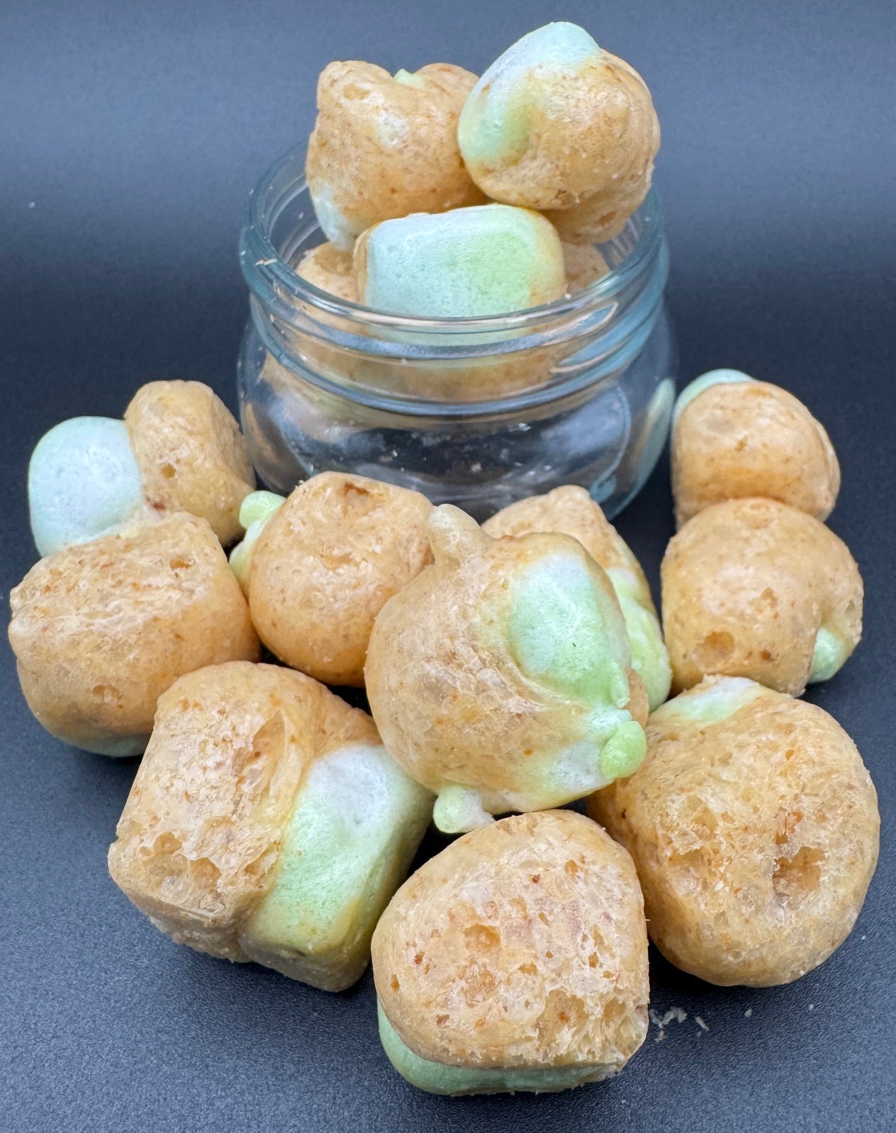 Light Brown and Light Green Airy Puffy Crunchy Different Shaped Bites just Melt in your mouth.